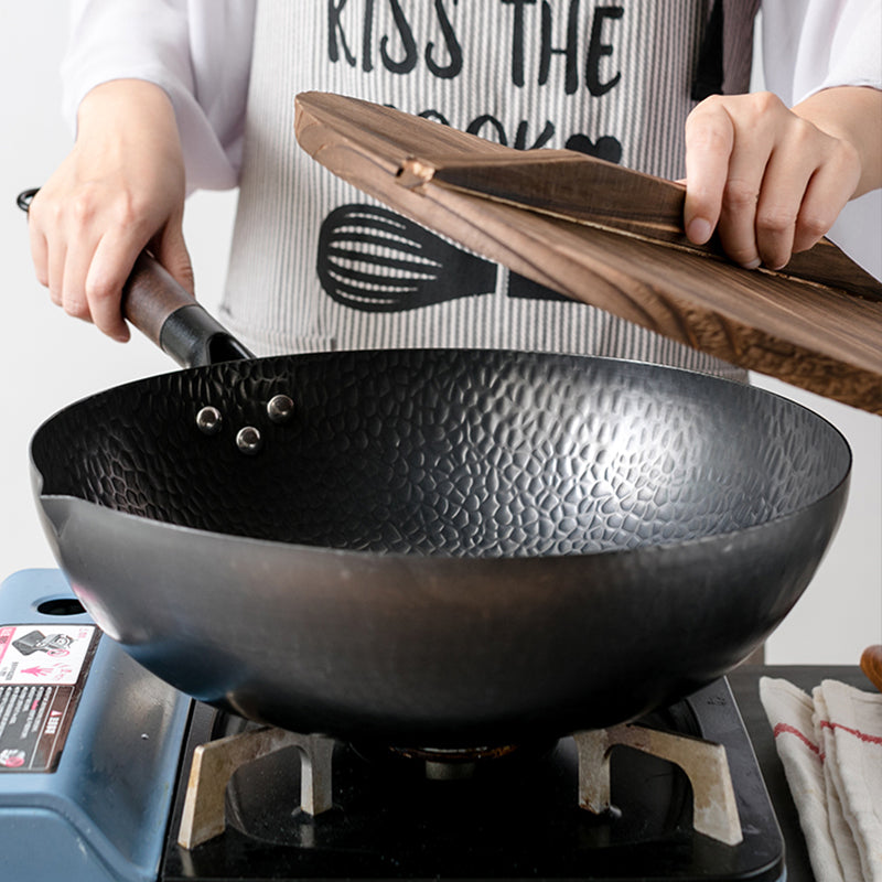 Discover the Art of Cooking with Our Handmade Iron Wok